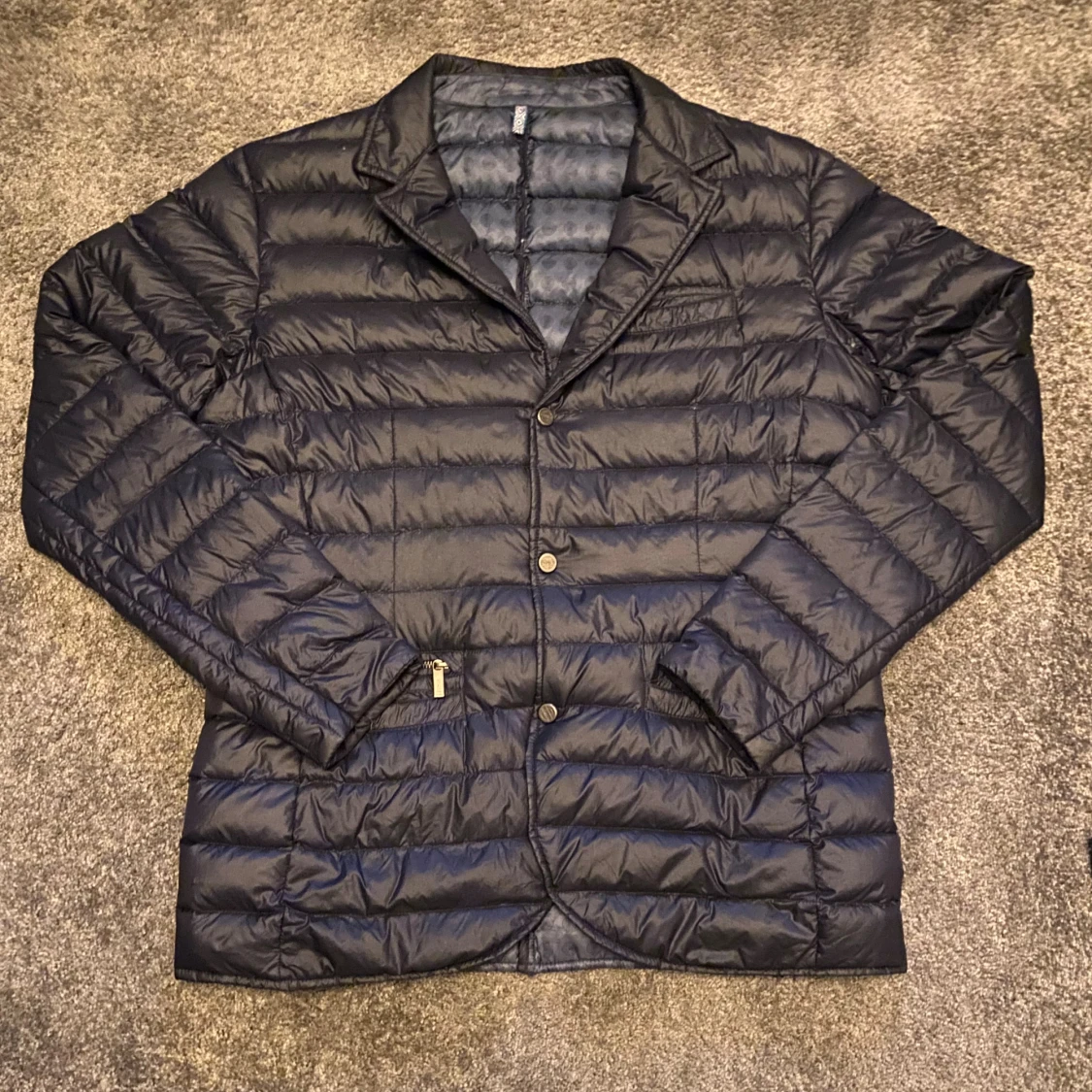 Mörkblå dunjacka från Strömberg