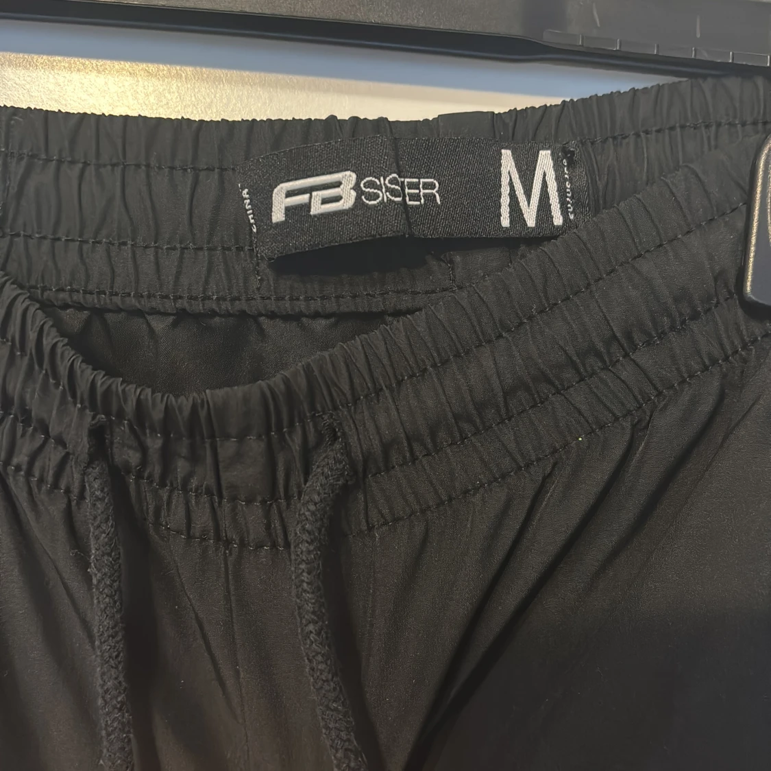 Svarta täckbyxor från FB Siser M - 1