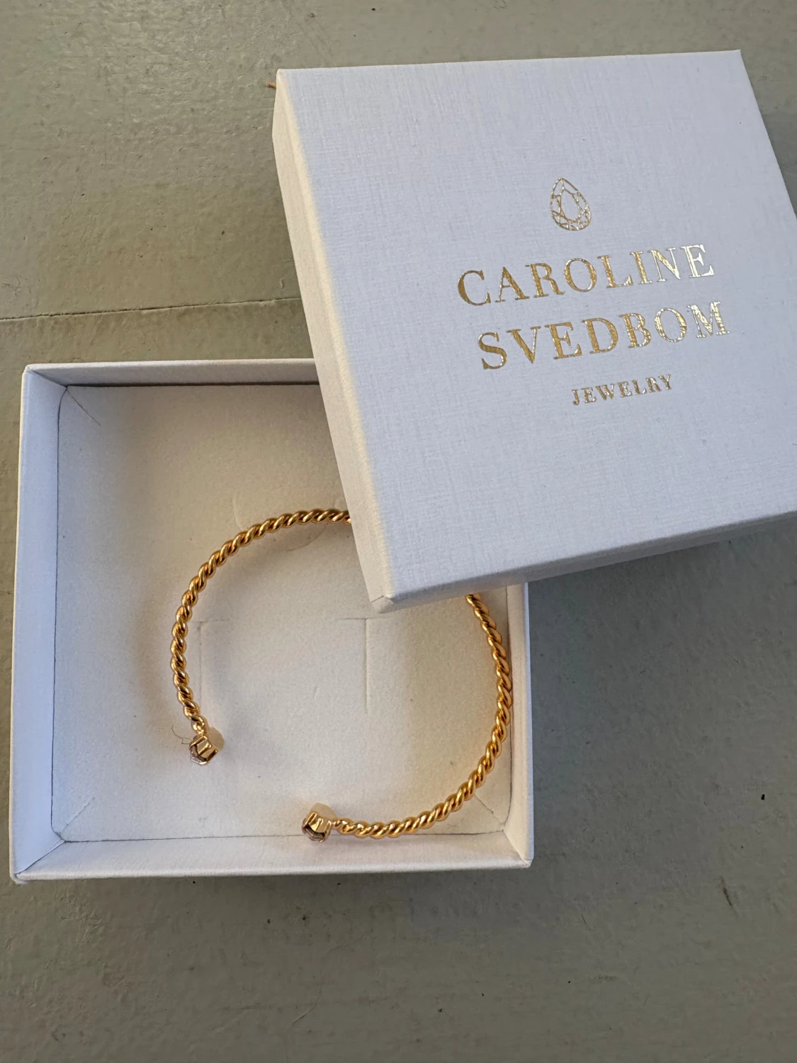 Guldarmband med kristaller Caroline Svedbom - 1