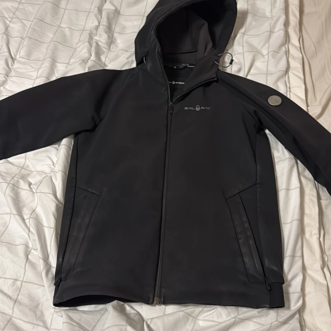 Svart vindjacka från Sail Racing