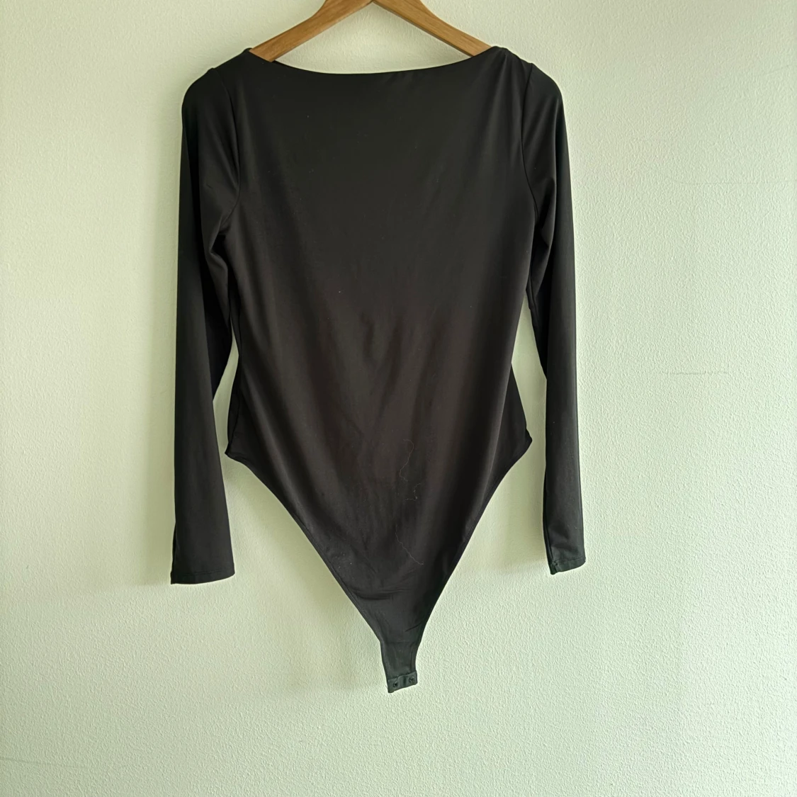 Svart långärmad bodysuit från H&M - 1