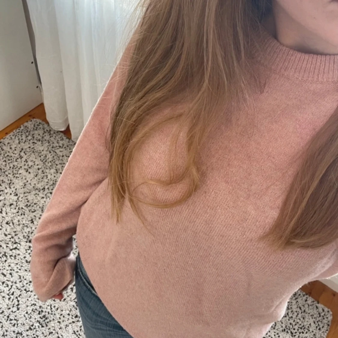 Ljusrosa stickad tröja