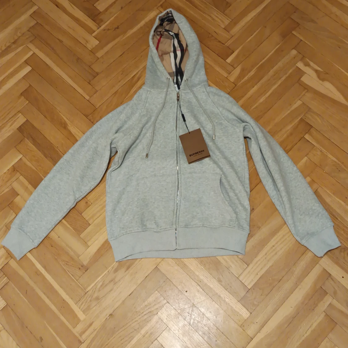 Grå hoodie Burberry med dragkedja