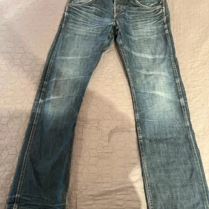 Vintage Wrangler jeans - Ett par riktigt snygga Vintage Wrangler jeans i modellen crank med riktigt fet wash i storlek 31/32!