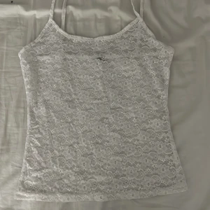 Spets linne - Ett spets linne i storlek xs men lappen har jag klippt bort, kommer ej ihåg vart jag köpt det 
