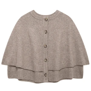 Beige stickad kofta med knappar  - Superfin beige stickad kofta med snygga knappar framtill. Koftan har en avslappnad passform och ribbade kanter, perfekt att slänga på sig när det är kyligt ute. Enkel och stilren design som passar till det mesta.