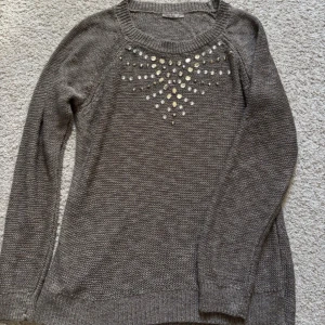 Stickad tröja - Stickad tröja med paljetter!