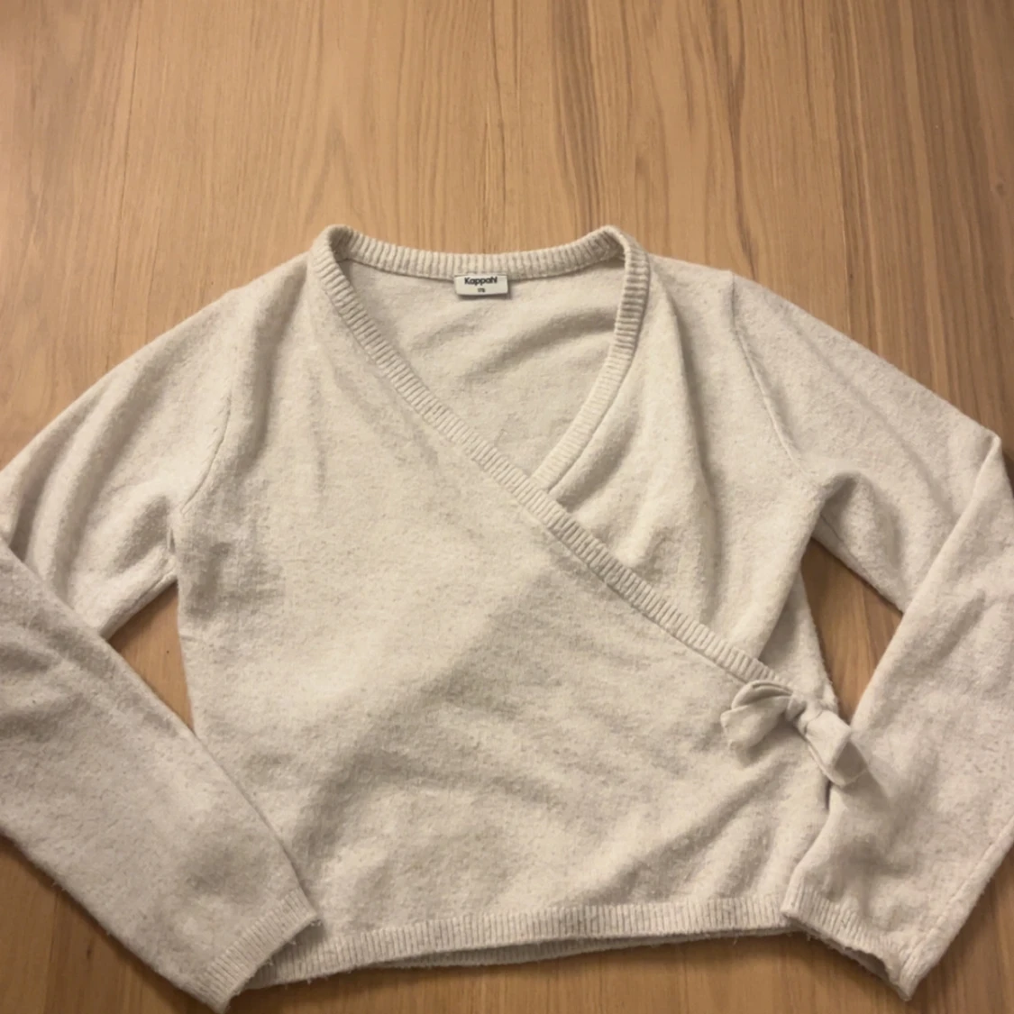 Beige omlottkofta från Kappahl