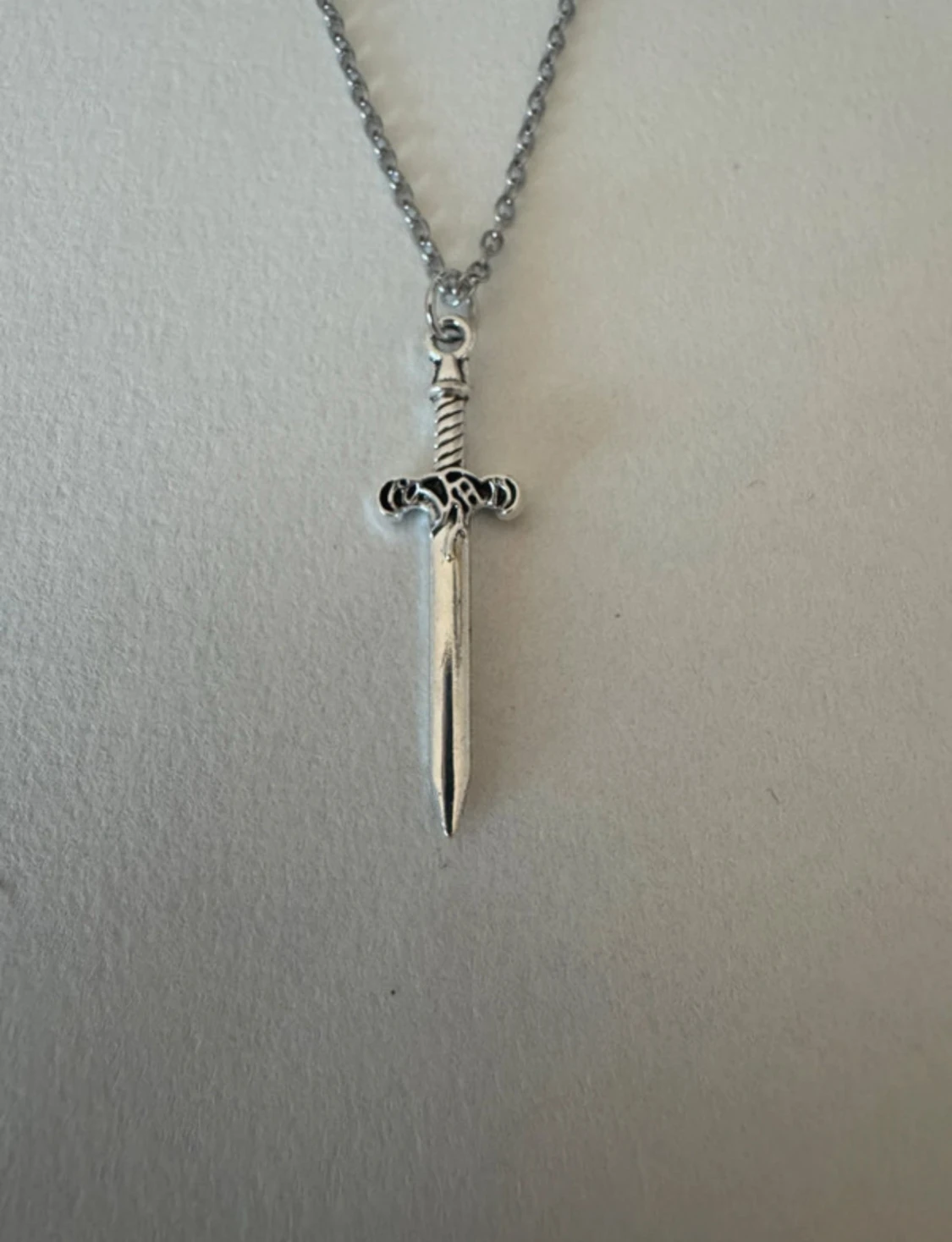 Silverhalsband mindre svärd