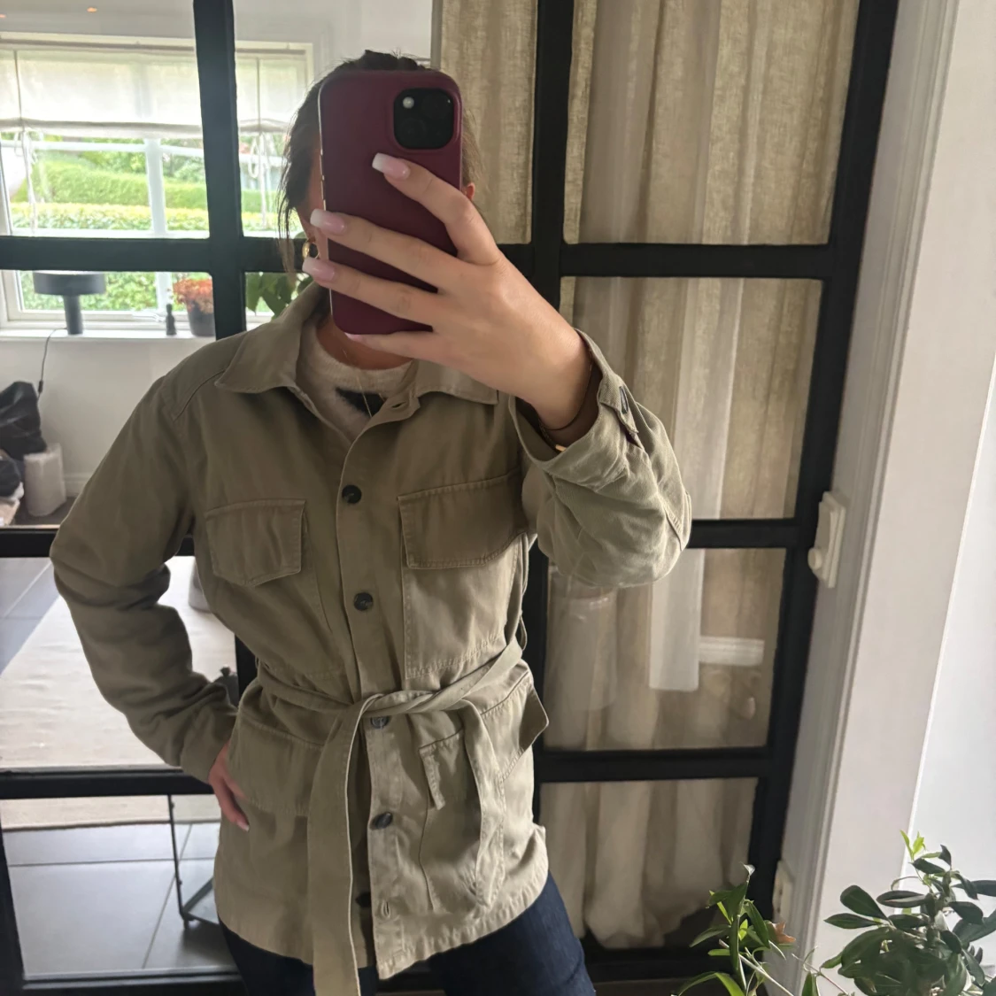 Grön jacka med bälte