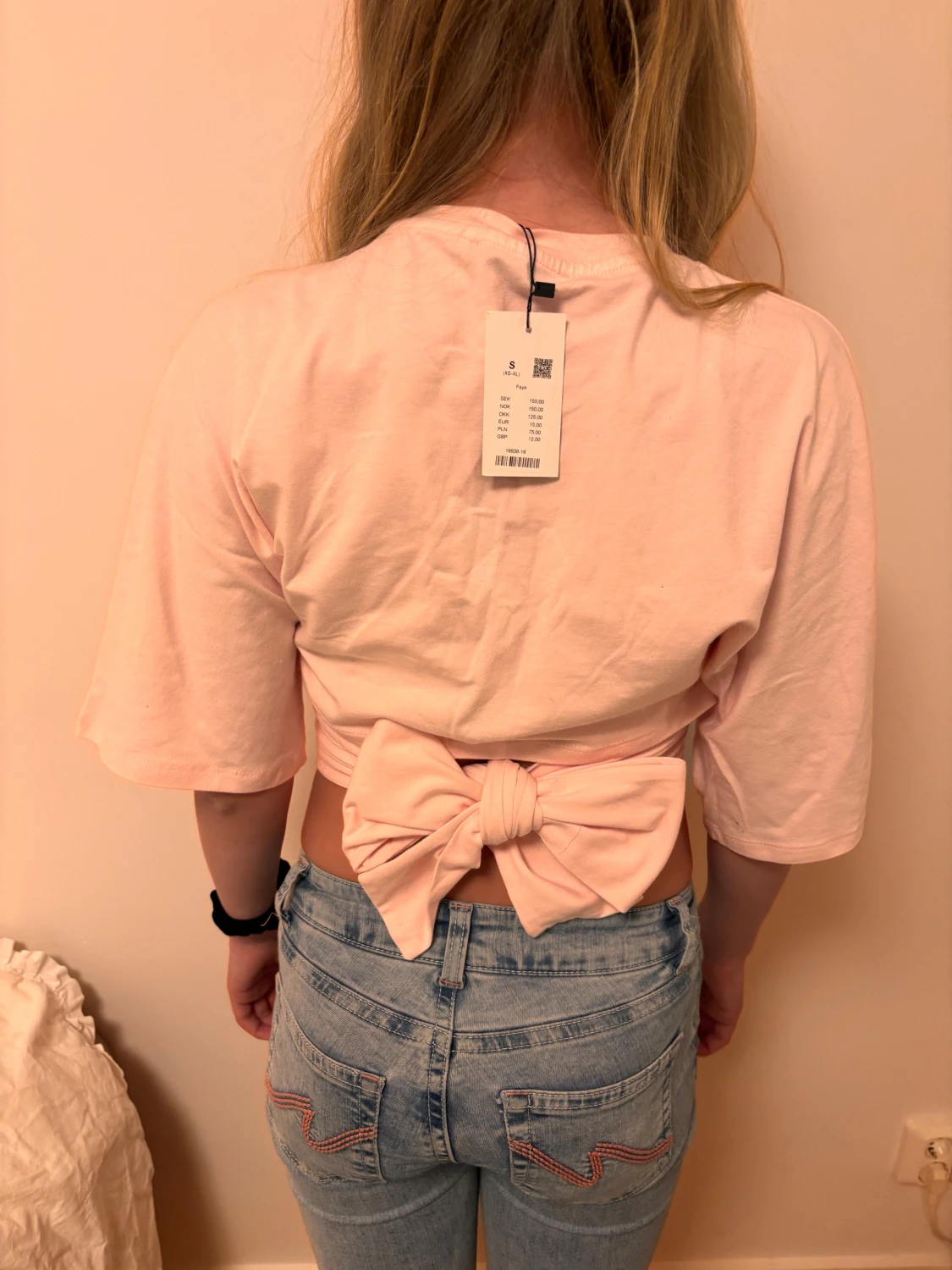 Ljusrosa croppad topp med rosett