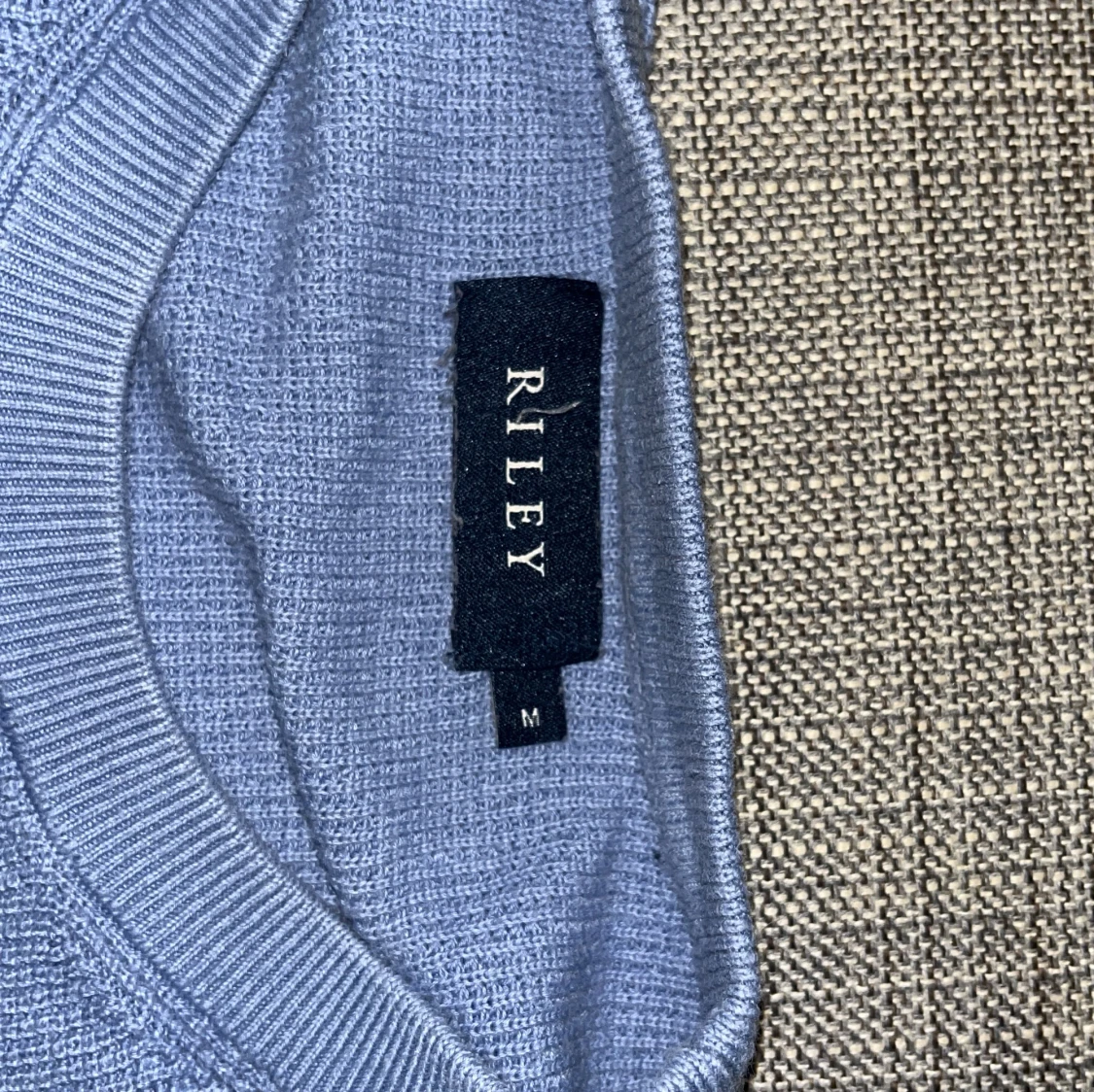 Ljusblå stickad tröja från Riley - 1