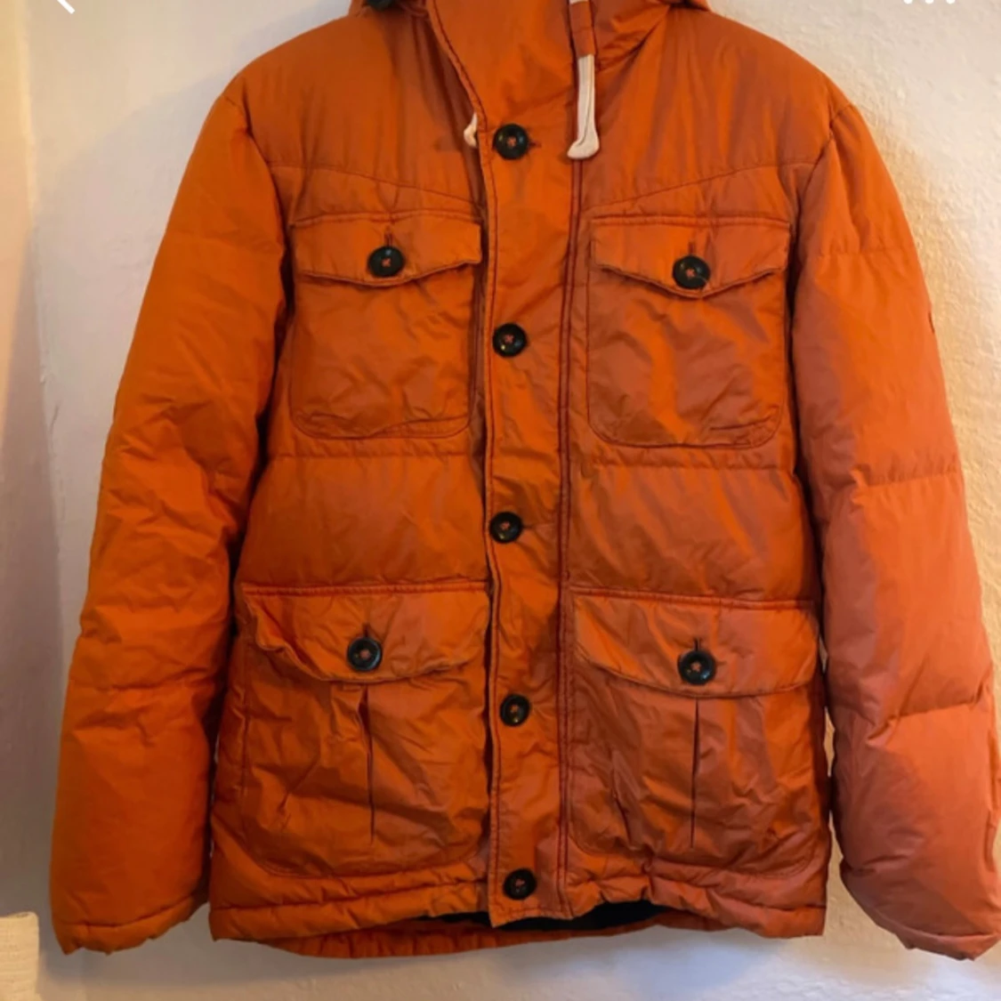 Orange pufferjacka med huva från Boomerang