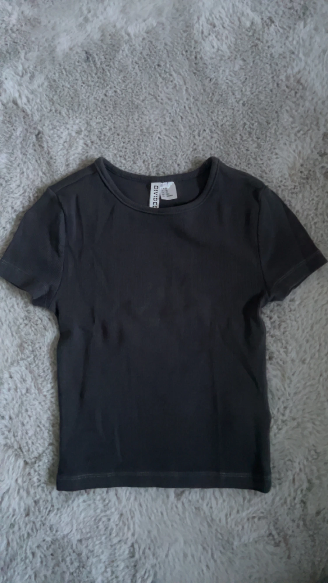 Svart ribbad topp från H&M