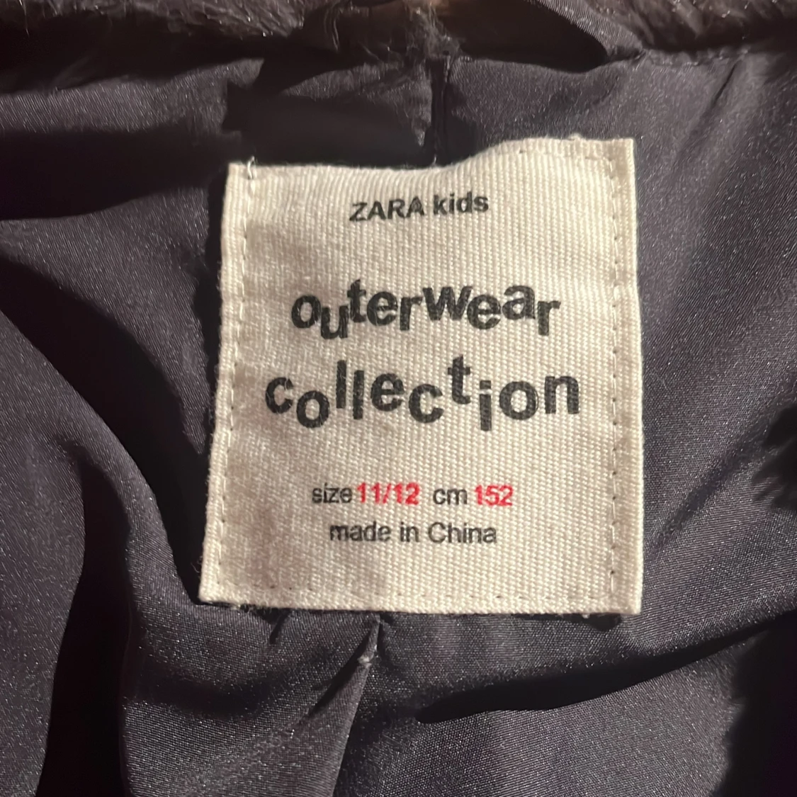 Mörkgrå pälsväst från Zara Kids - 1