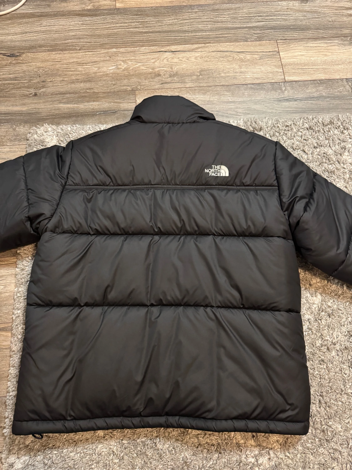 Svart pufferjacka från The North Face - 1