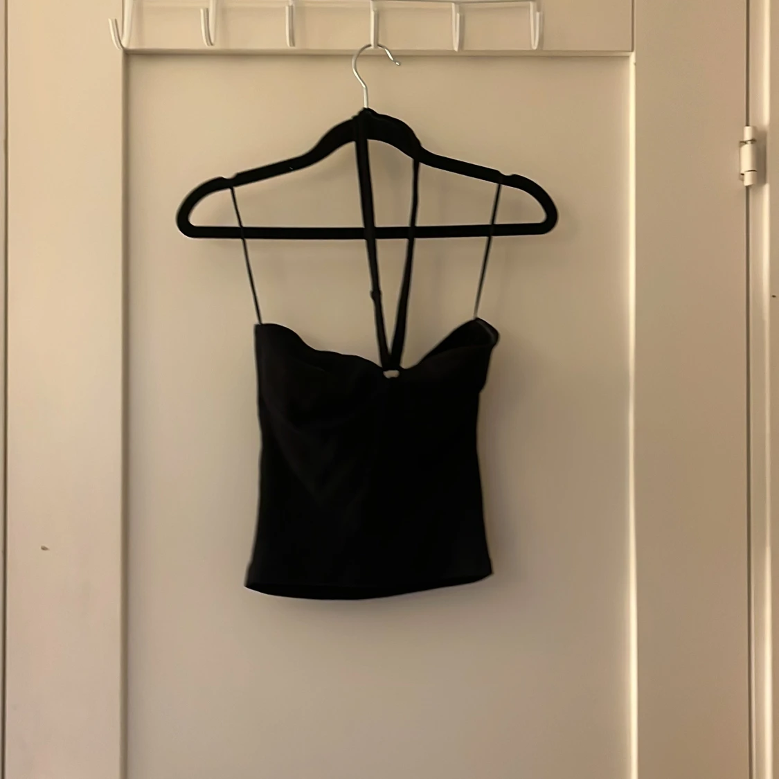 Svart korsett-topp från Gina Tricot