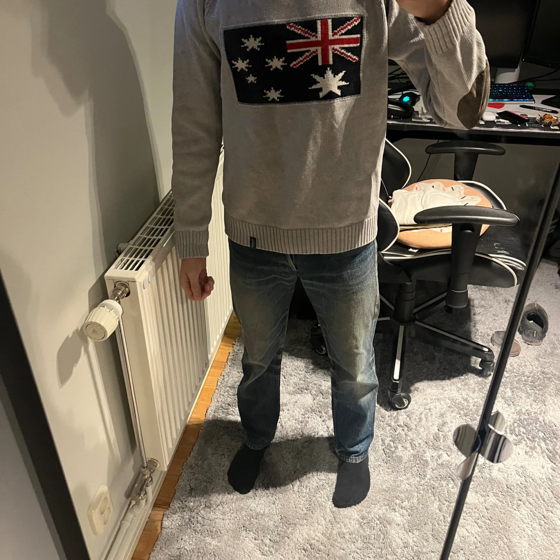 Stickad tröja med tryck