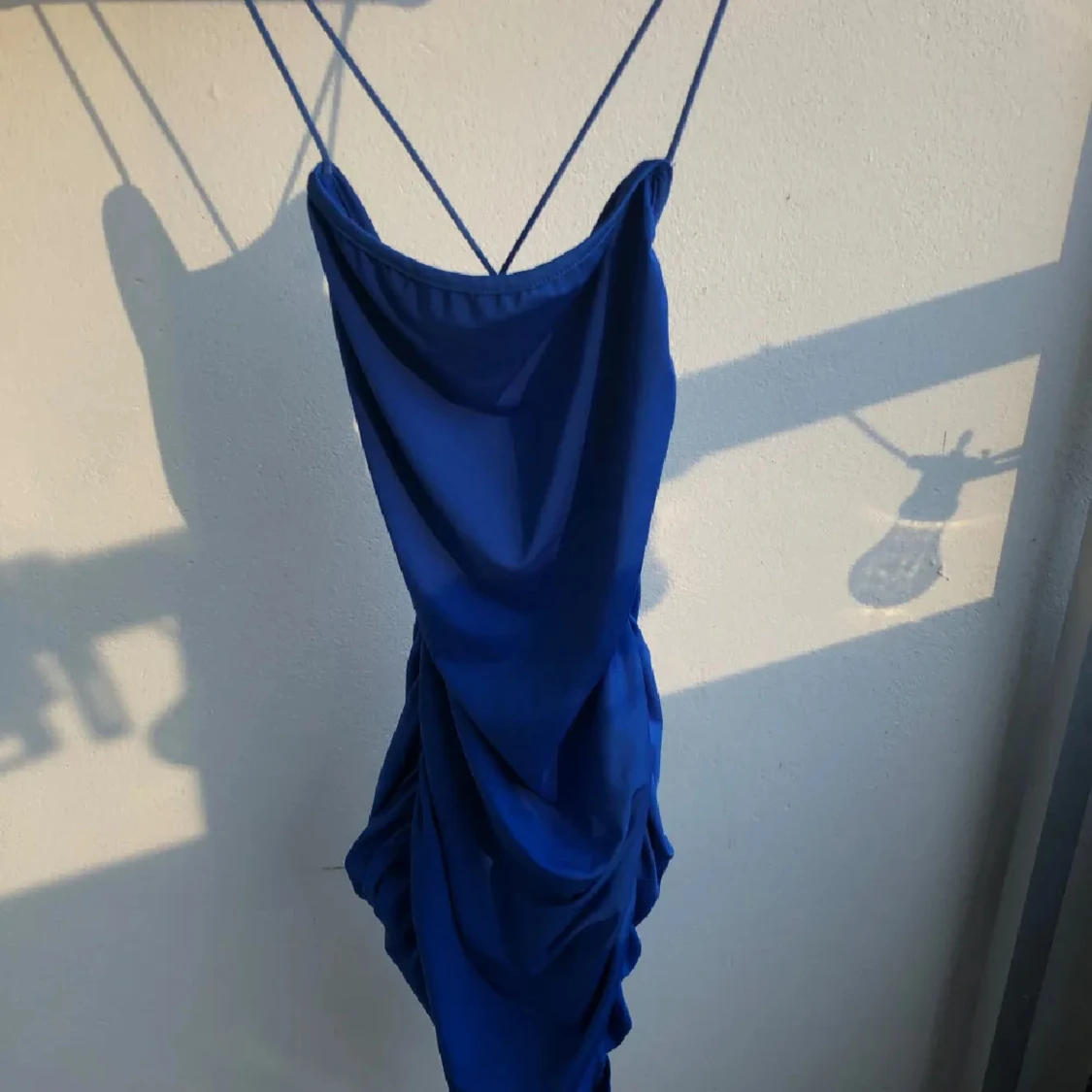 Blå klänning med smala axelband