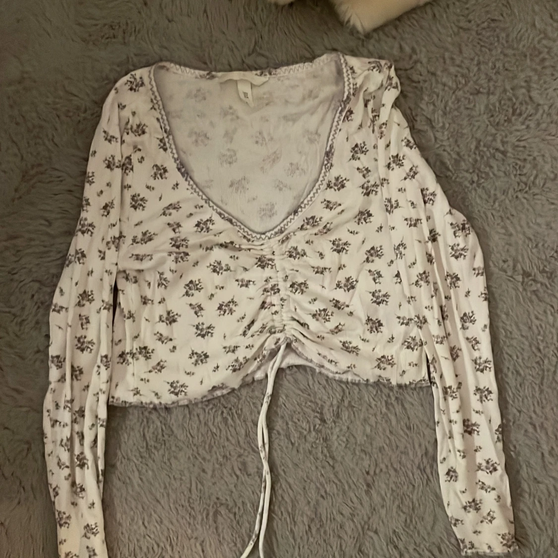 Blommig croppad topp från H&M