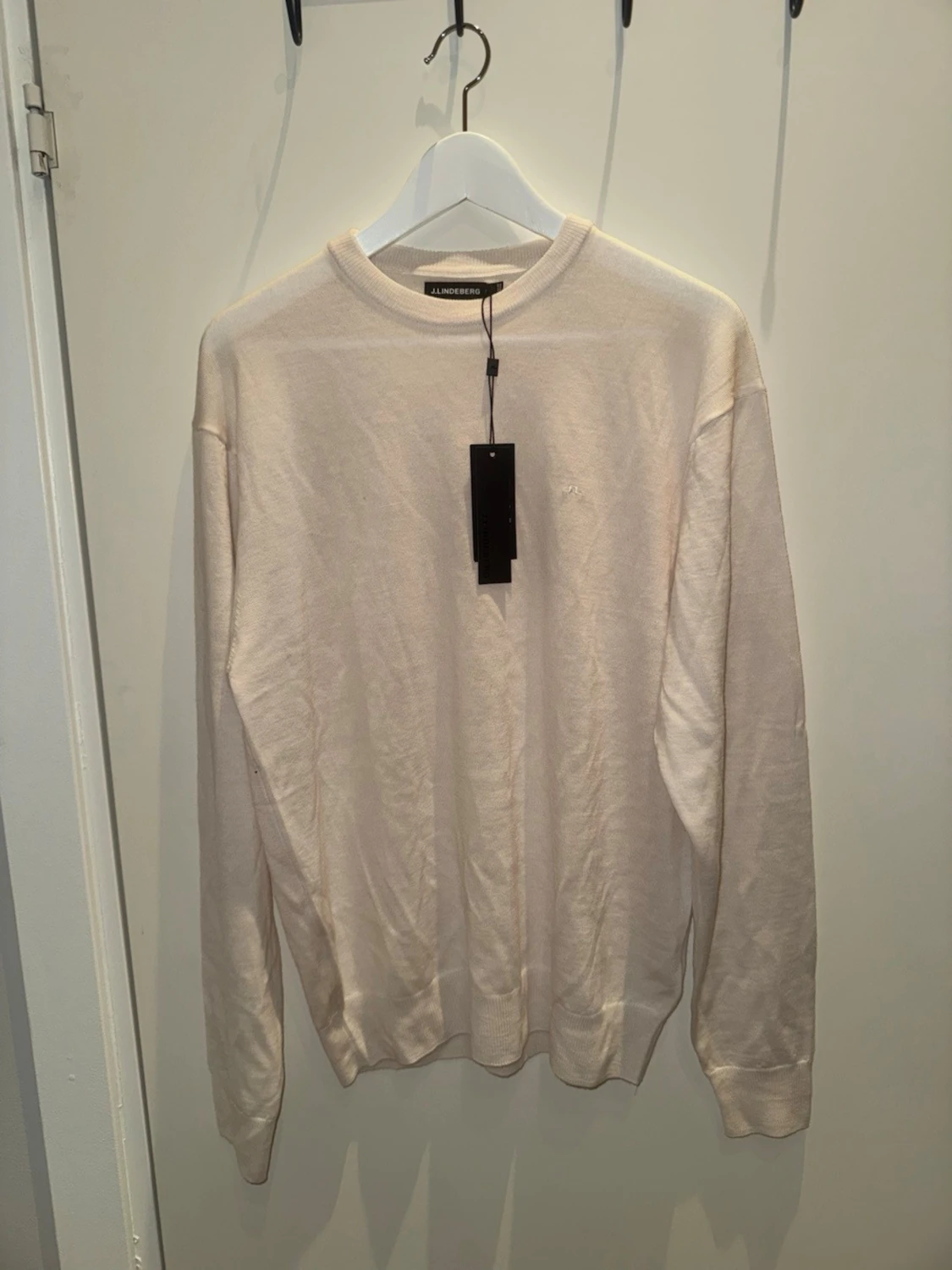 Vit merinoullströja från J.Lindeberg