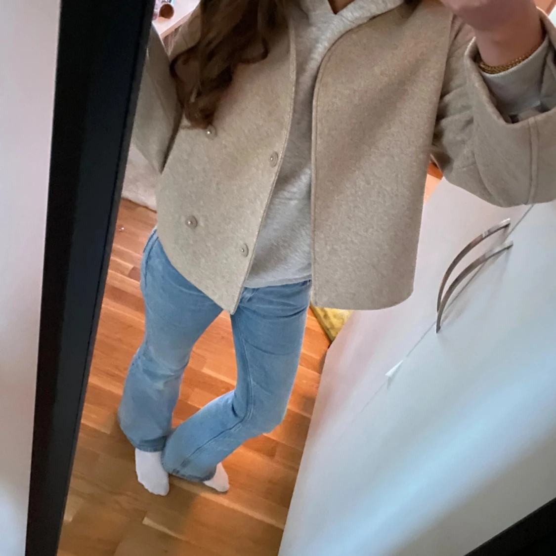 Beige kappa med knappar - 1