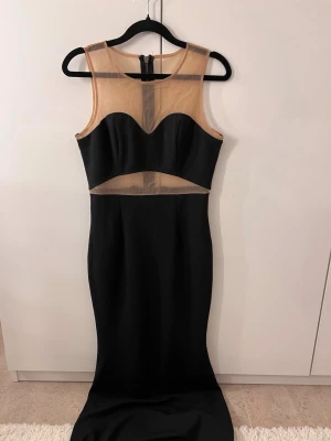 Klänning,svart - Använd en gång