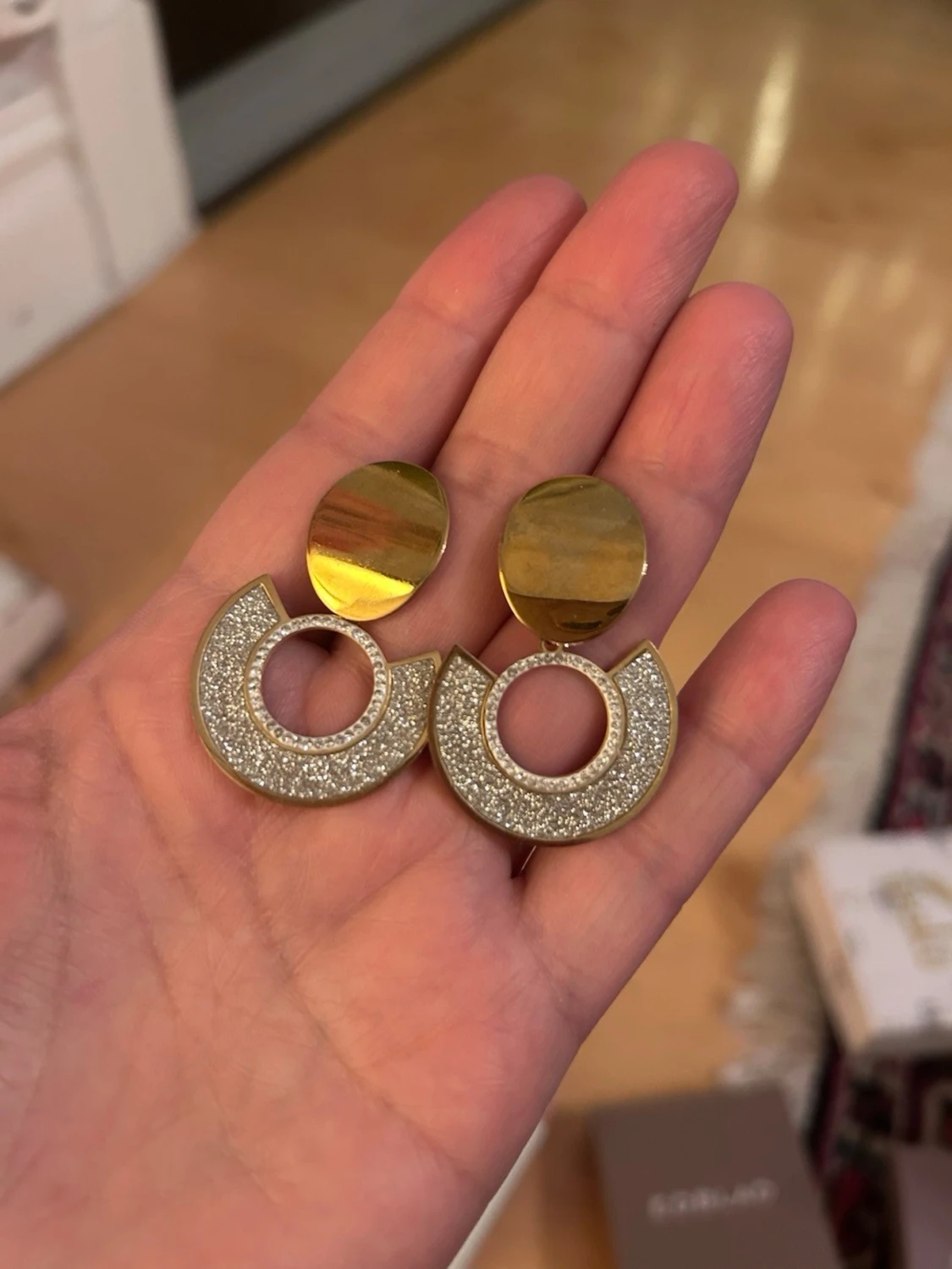 Stål örhängen i guld och silver