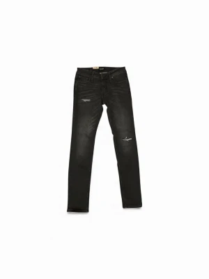 Jack & Jones svarta skinny jeans - Svarta skinny jeans från Jack & Jones med slitna detaljer vid knä och lår. Modellen, smal passform och stretchigt,jeanstyg för extra komfort. Perfekt för dig som gillar en modern och tajt look.