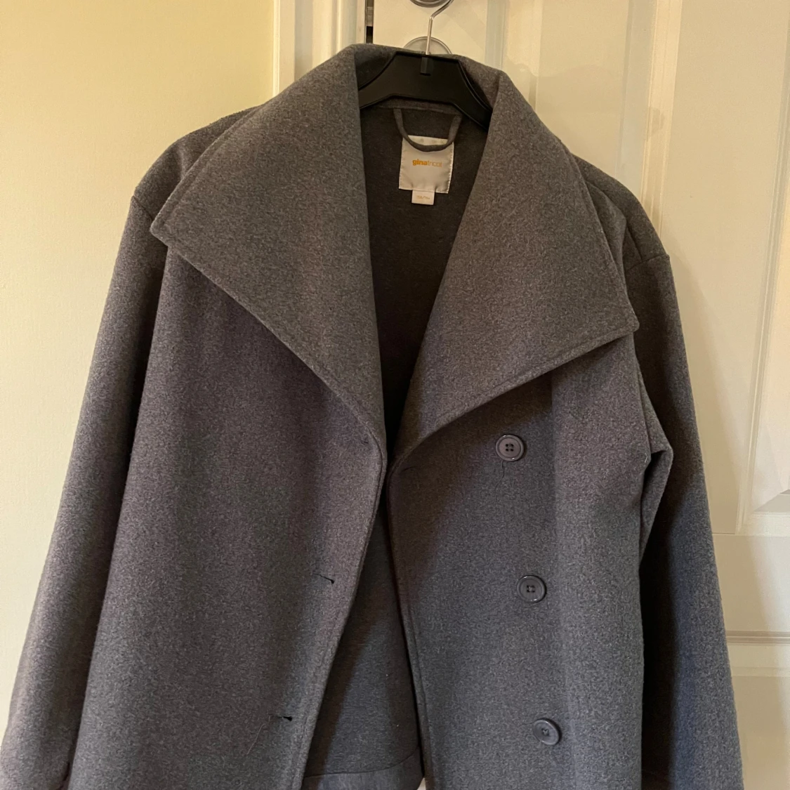 Grå kappa från Gina Tricot