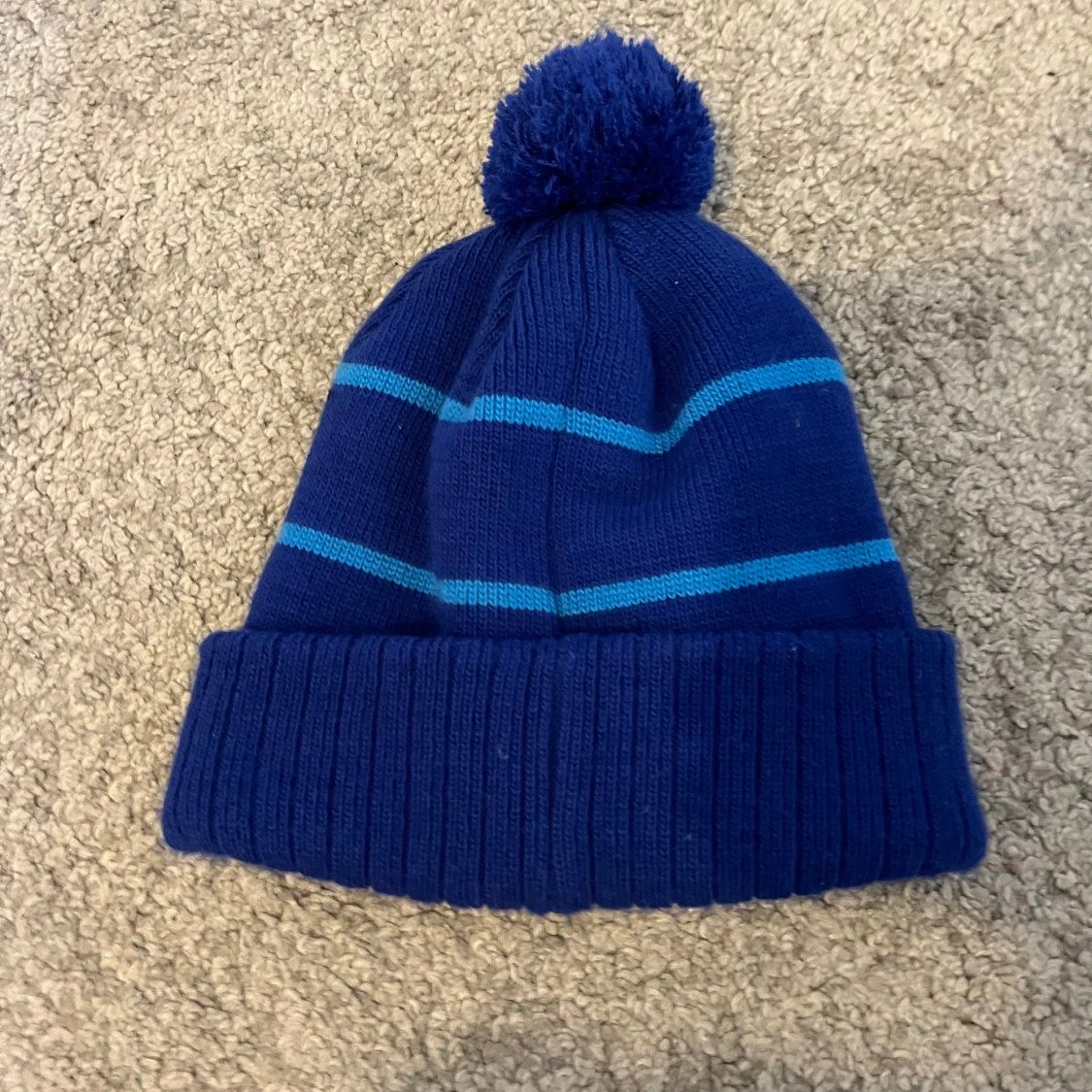 Blå NOCCO mössa med tofs - 1