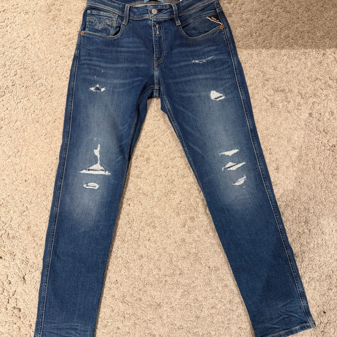 Replay Anbass blå jeans med slitningar