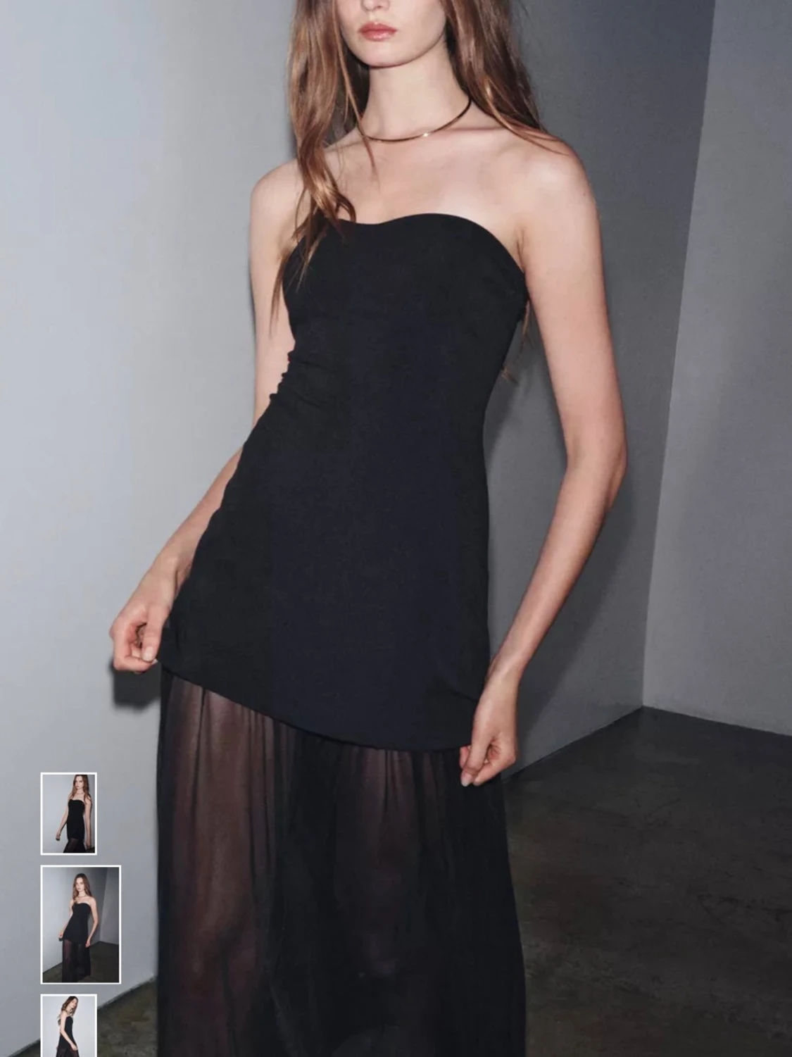Svart axelbandslös långklänning