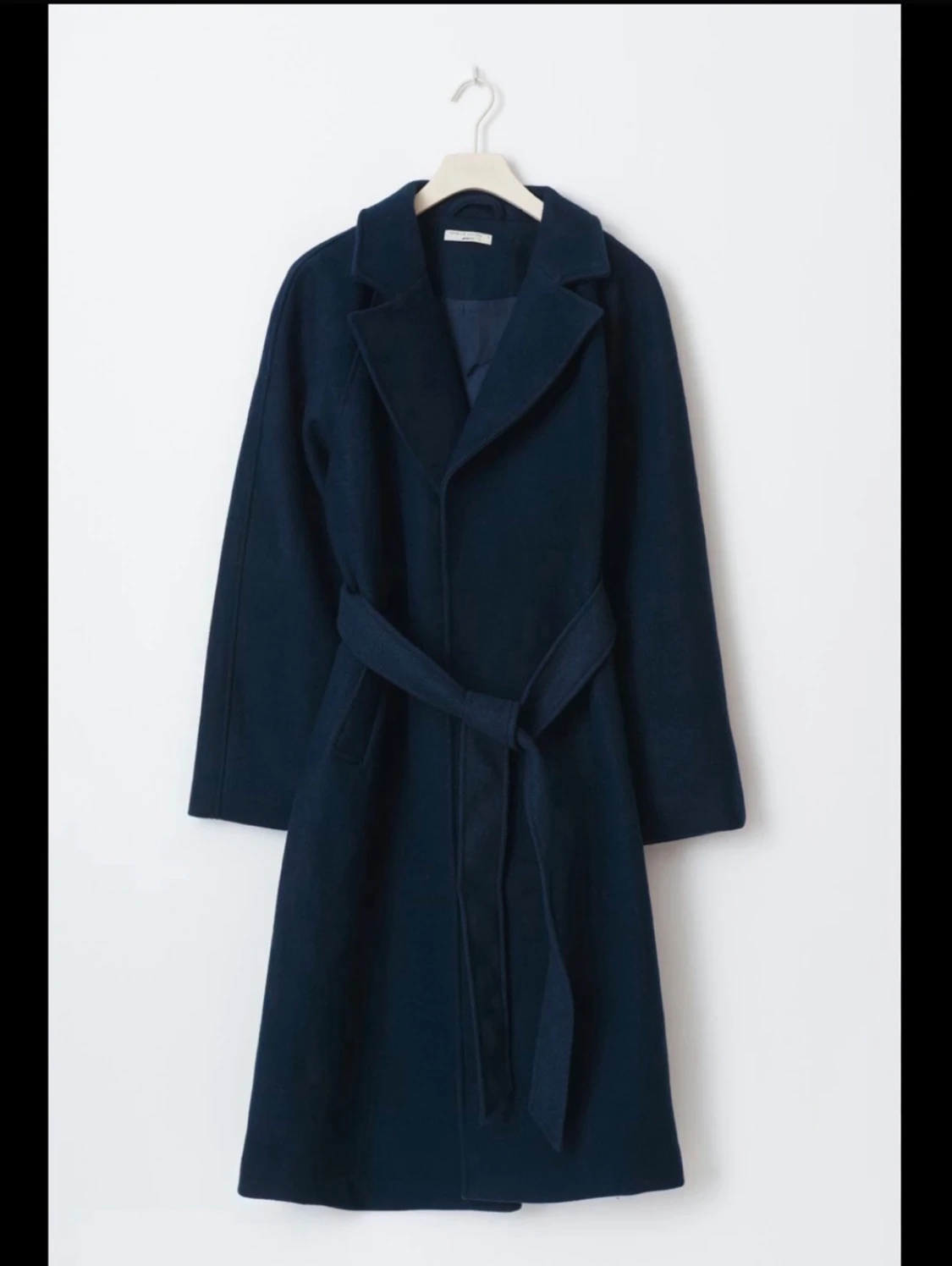 Mörkblå kappa med bälte