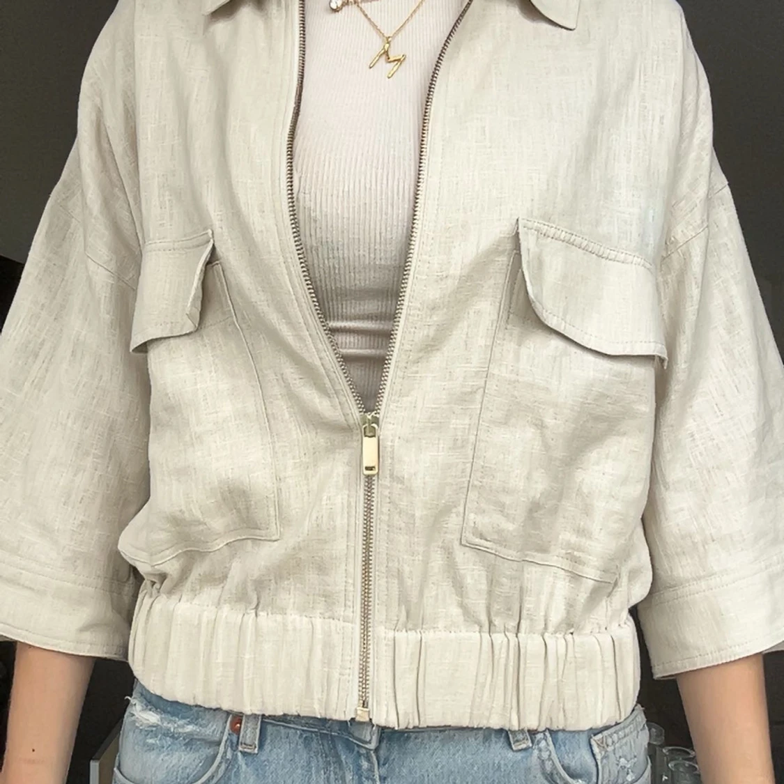 Beige overshirt med dragkedja