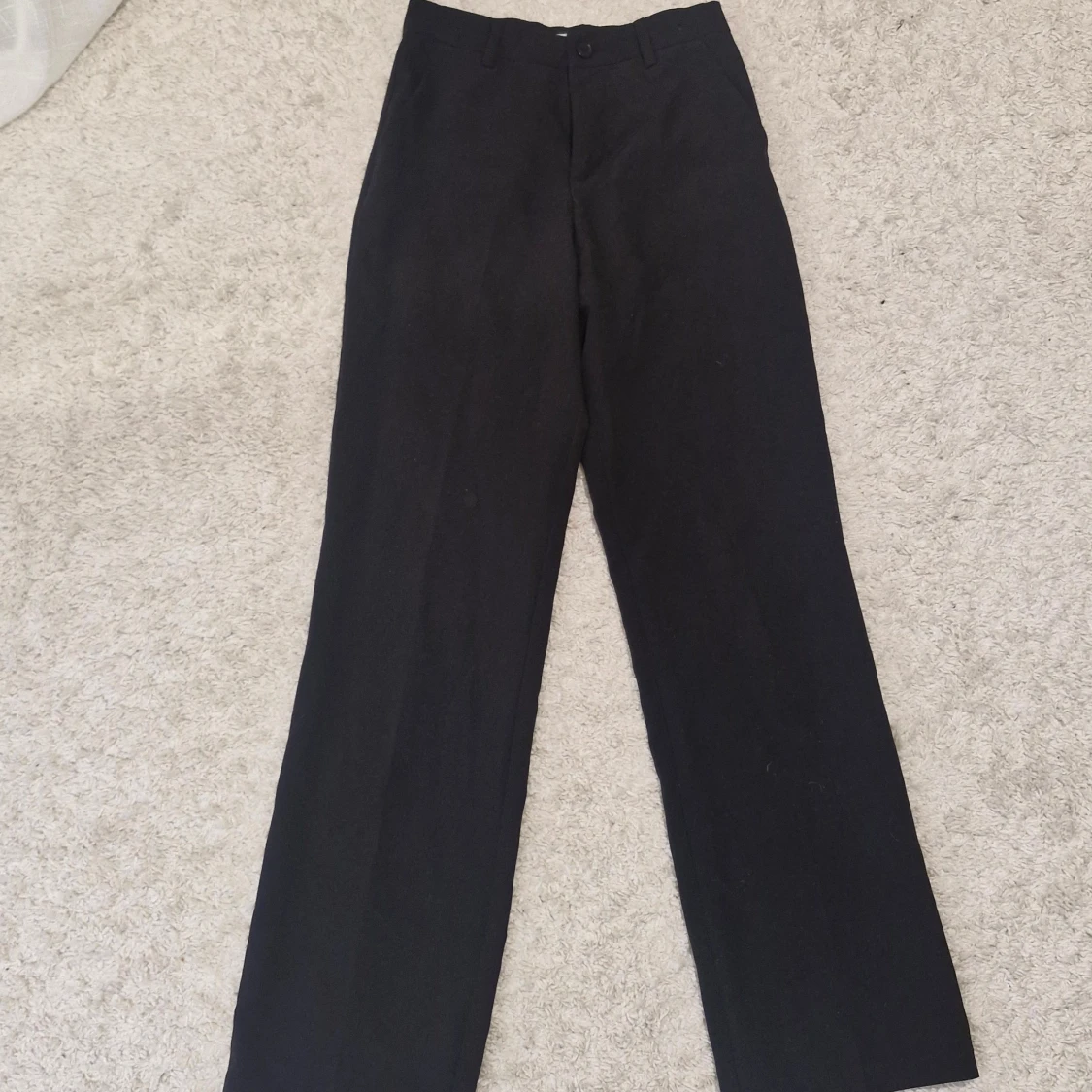 Svarta kostymbyxor från Lindex