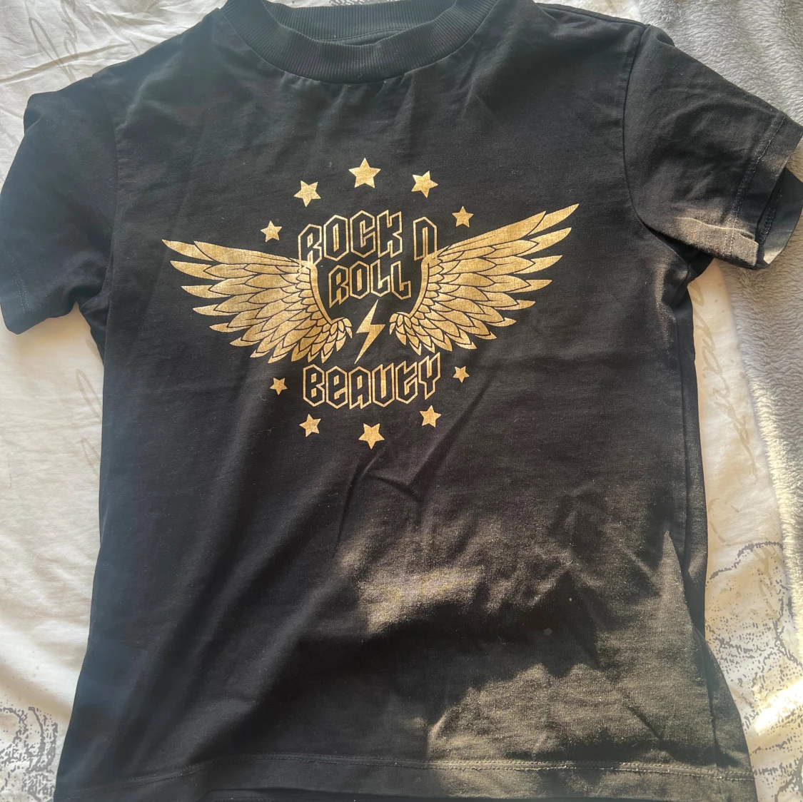 Svart t-shirt Rock n Roll Beauty från Name It