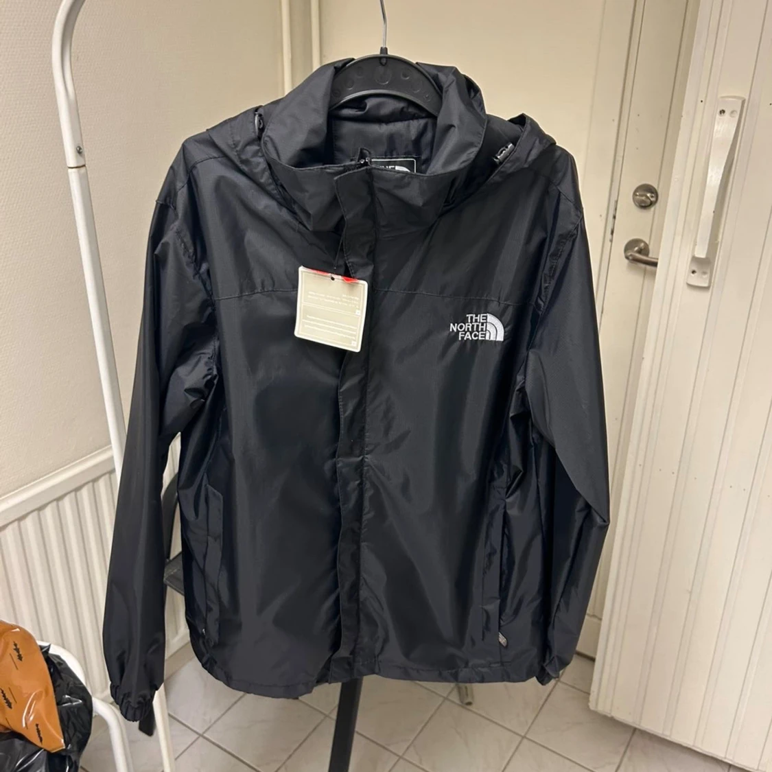 Svart vindjacka från The North Face