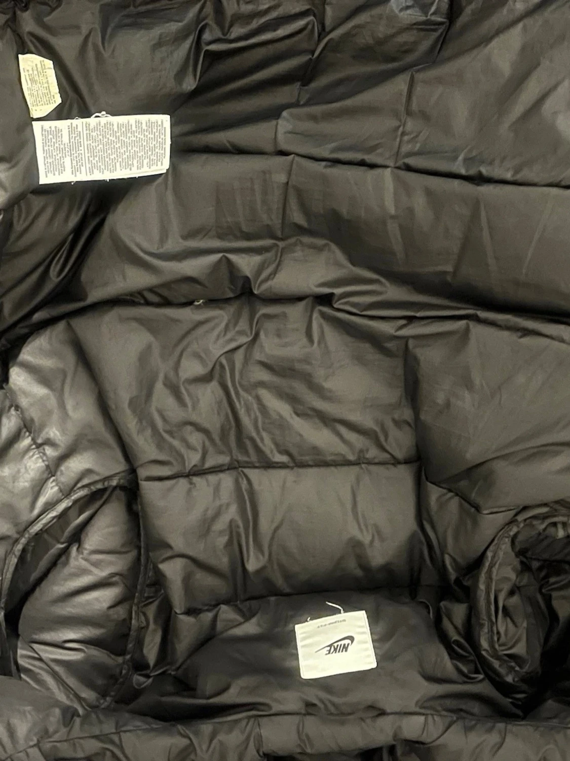 Svart pufferjacka från Nike