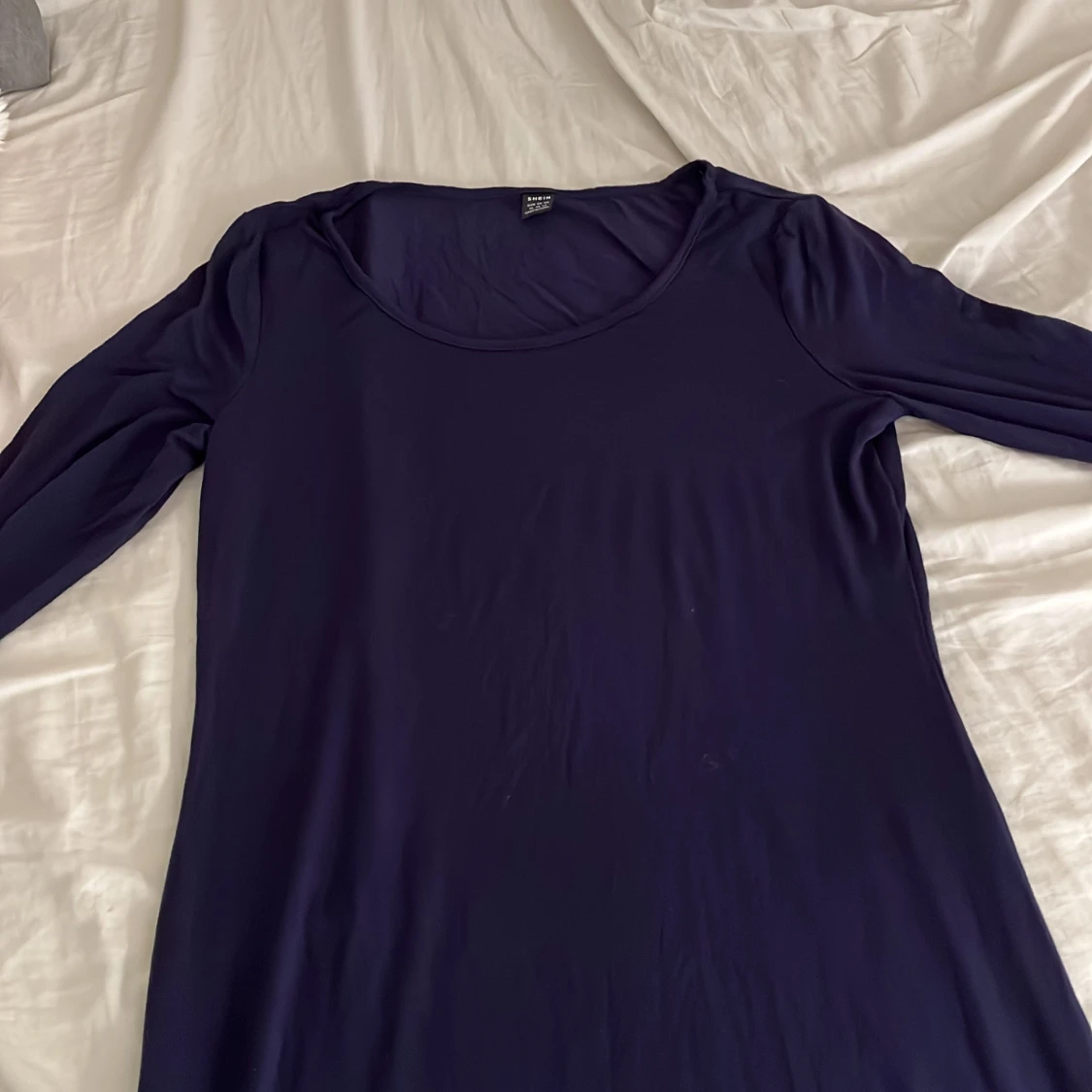 Mörkblå långärmad klänning