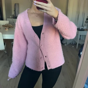 Stickad kofta mobil - Så snygg 