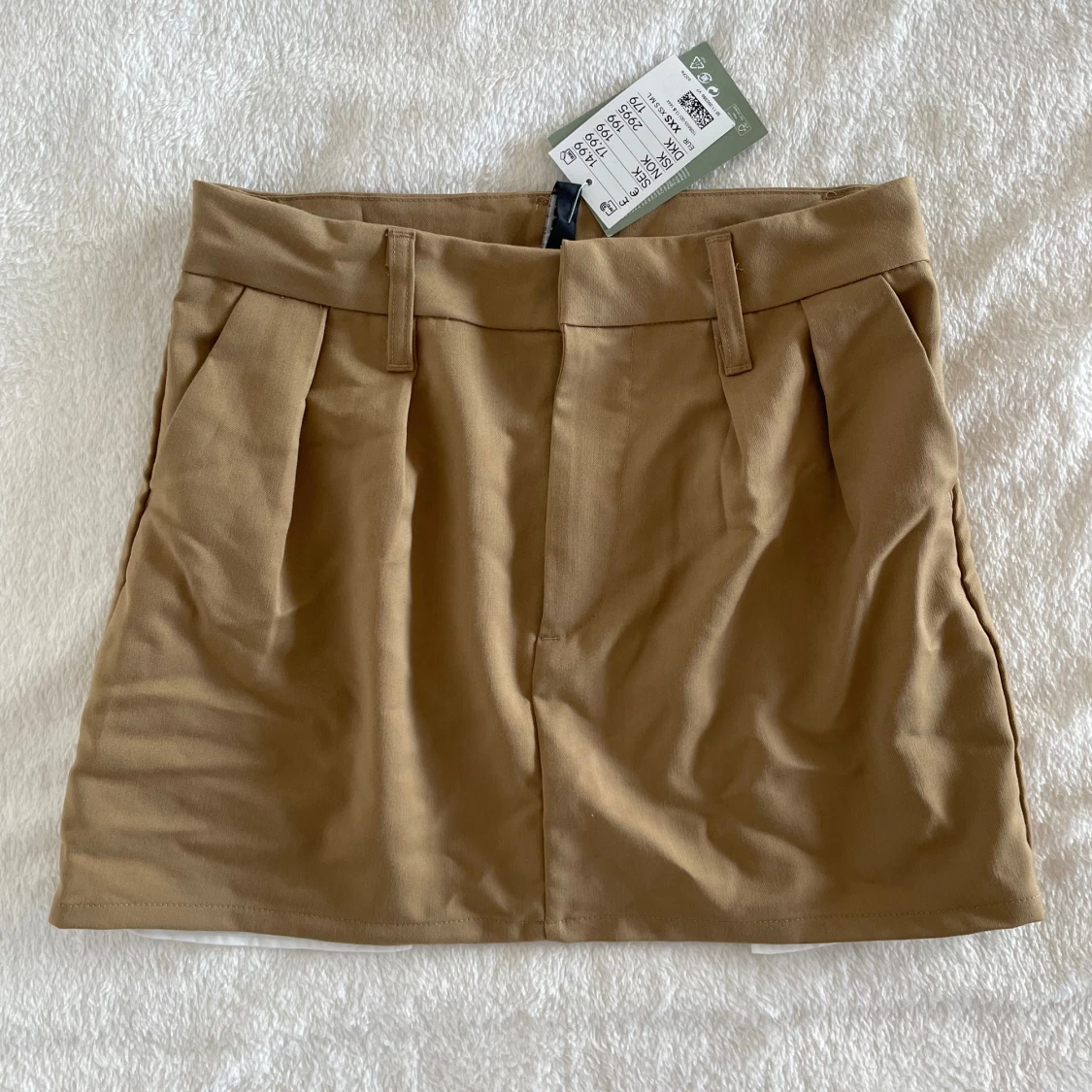 Beige kortkjol från H&M Divided XXS