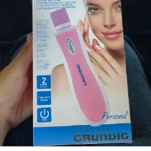 Grundig Personal Electric Nail Care Set - Elektrisk nagelvårdset från Grundig med ergonomisk design och enkel on/off-funktion. Inkluderar tillbehör för buffing och filling. Levereras i originalförpackning, ser ut att vara i nyskick. Perfekt för manikyr hemma. 2 års garanti medföljer.