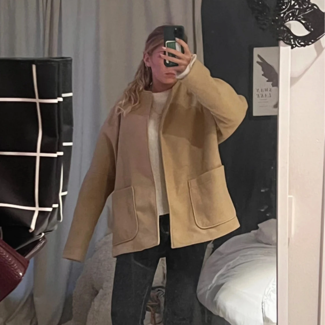 Beige kappa med fickor 