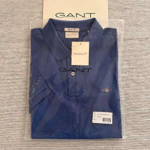 Pikétröja Gant - 👕Pikétröja   Märke: Gant Skick: 10/10 - Helt ny Storlek: L Pris: 699 kr 📦Skickas omgående eller hämtas i Lidköping  🧾Kvitto finns  🤔Frågor eller funderingar?  Då är det bara att höra av sig via dm eller maila till marloefashion@gmail.com  Tack för att du handlar hos Marloé Fashion. 