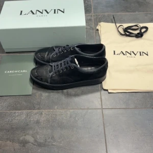 Svarta lanvins  - Snygga svarta skor från Lanvin.  Skorna levereras med originalkartong och dustbag.