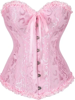 Rosa korsett med rosett och spets - Säljer en ljusrosa korsett med vackert broderat mönster och dekorativ rosett framtill. Korsetten har spetsdetaljer längs kanterna och knäppning framtill. Perfekt för dig som vill ha en feminin och snygg topp med extra detaljer.