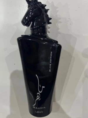Lattafa Maahir Black  - Lattafa maahir black 99ml kvar utan box, Säljer/Byter  men helst byte