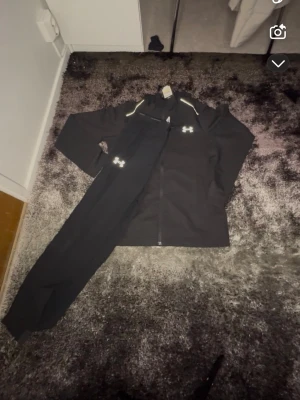 Trucksuit med väskan  - Trucksuit med väskan 