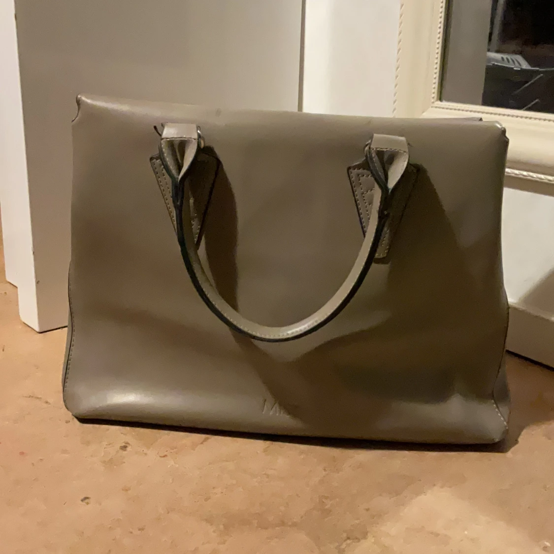 Beige handväska i skinn